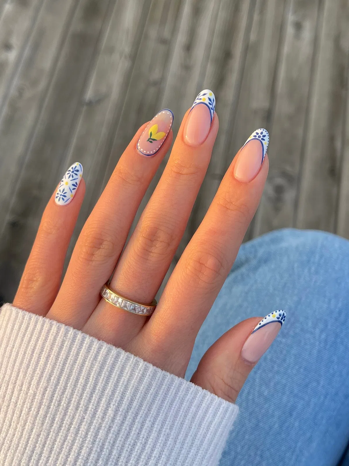 Blue patterned French tips with lemon accent