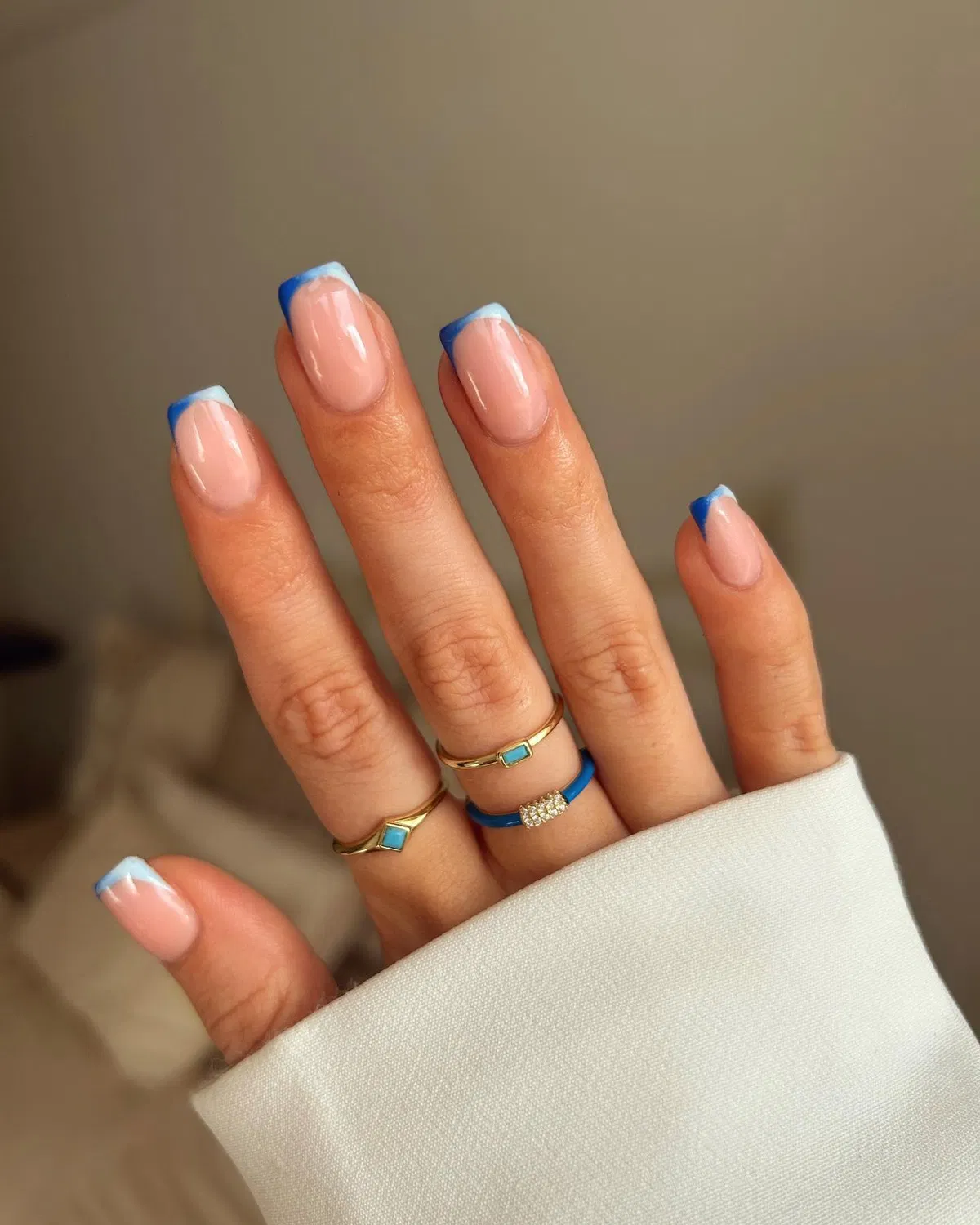 Blue ombré French tips on square nails
