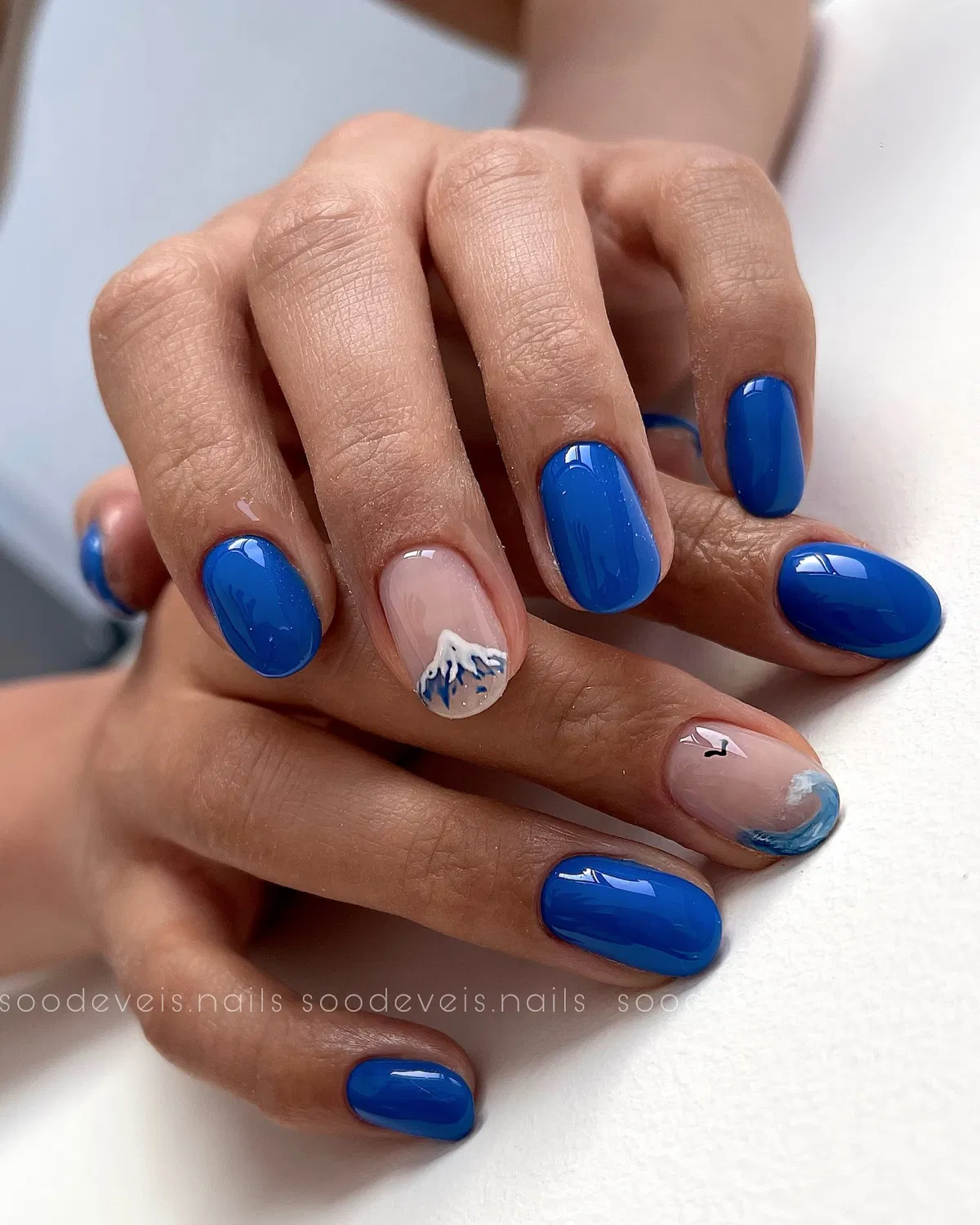Solid blue with painted accent scenes
