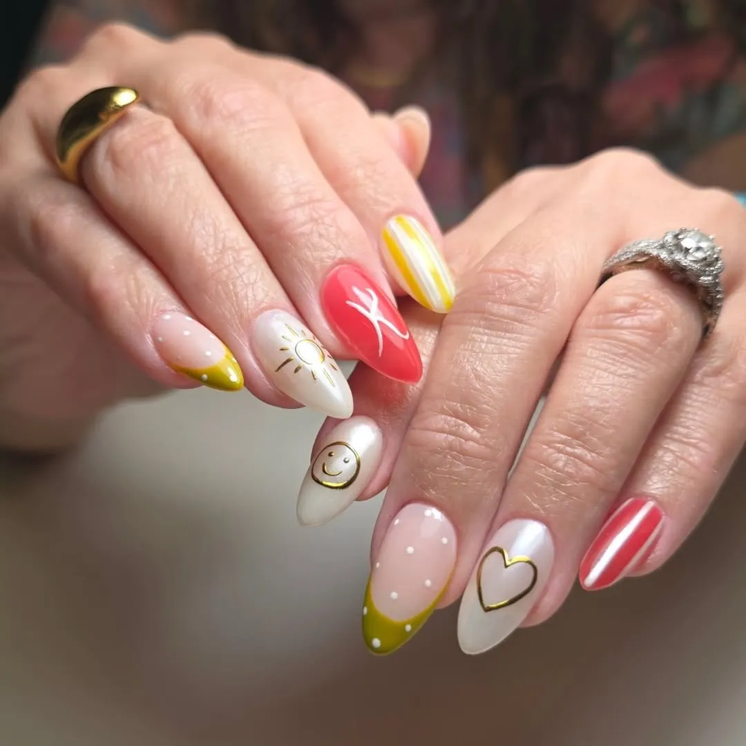 Orange shimmer set with white marbled accent nails