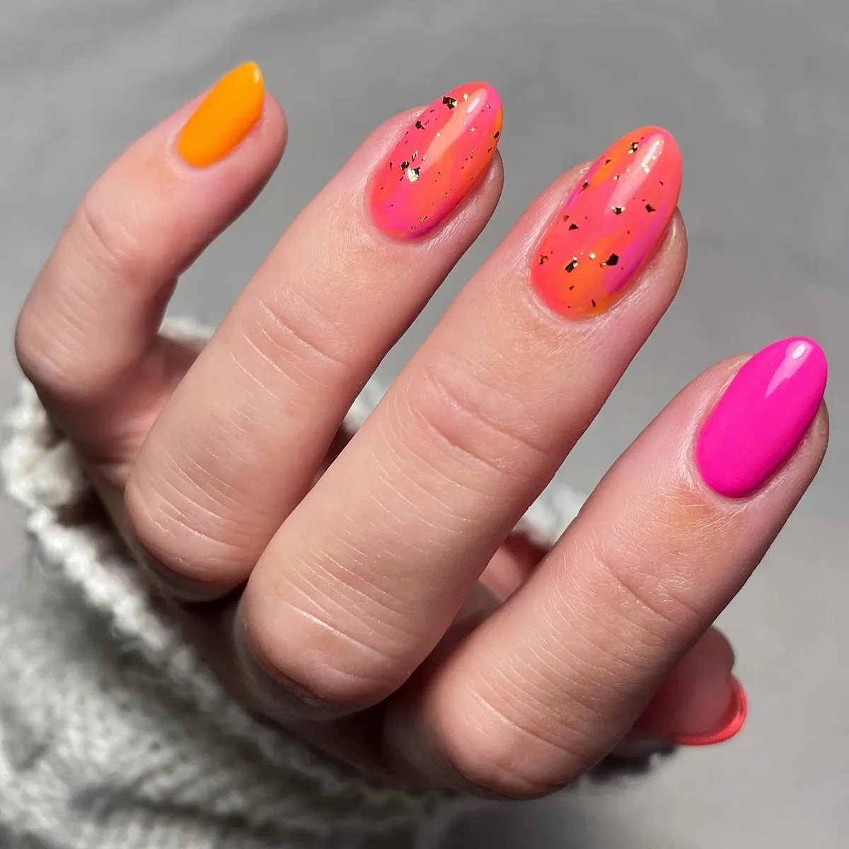 Hot pink and orange gradient with gold flecks