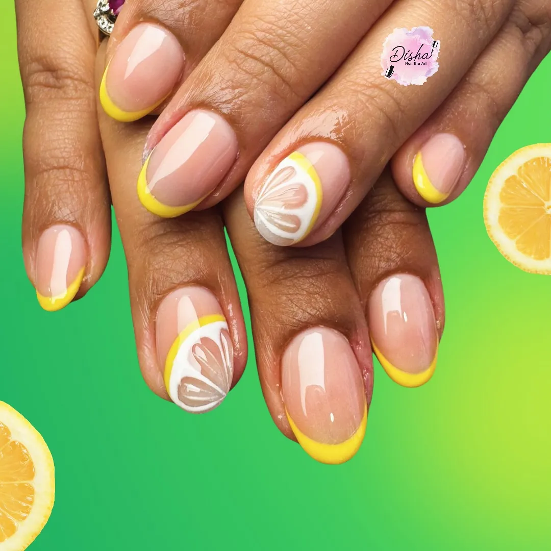 Yellow French tips with minimal citrus slice accents