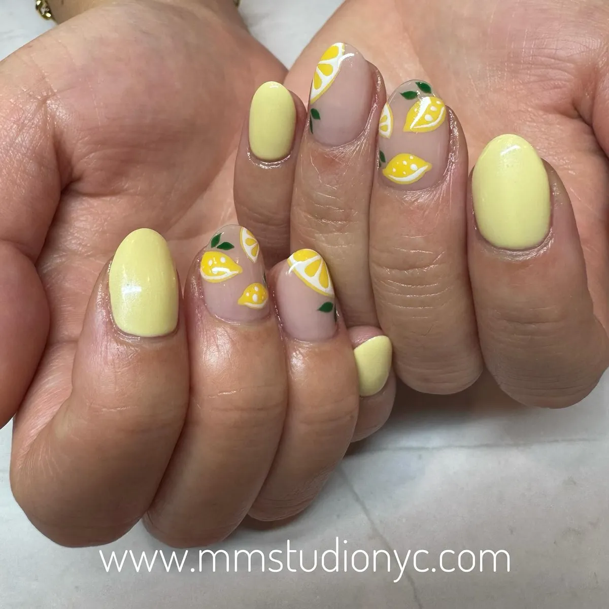 Pale yellow solids with lemon-slice accent nails
