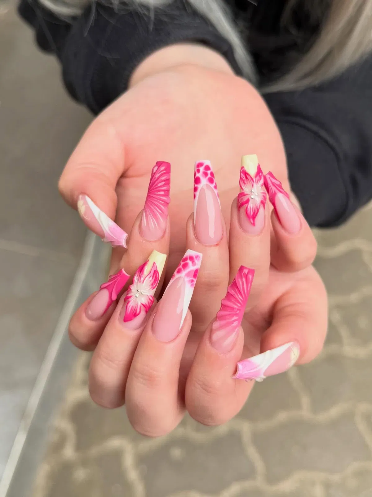 Pink florals with textured ridges and patterned tips