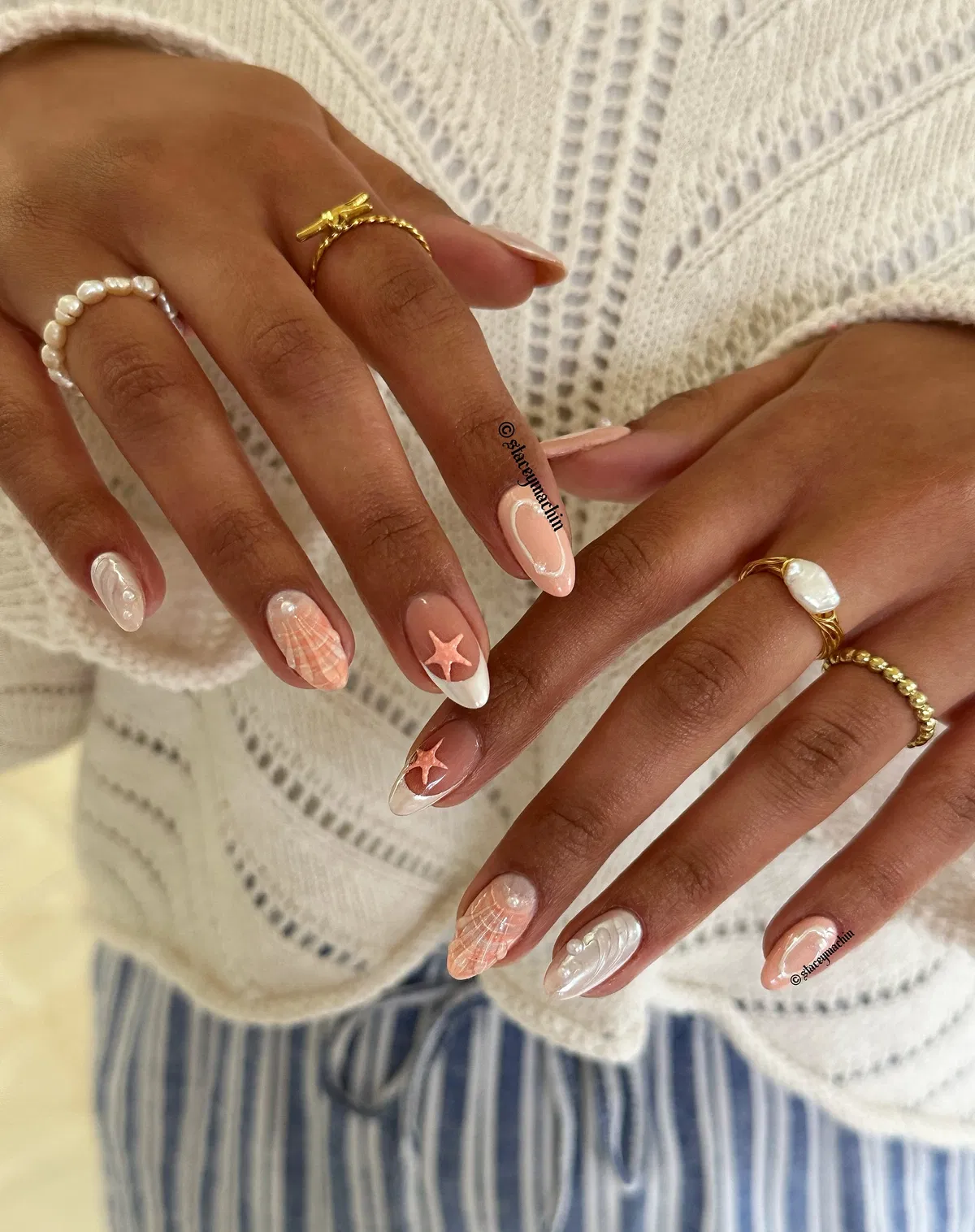Sheer nude nails with tiny white daisies