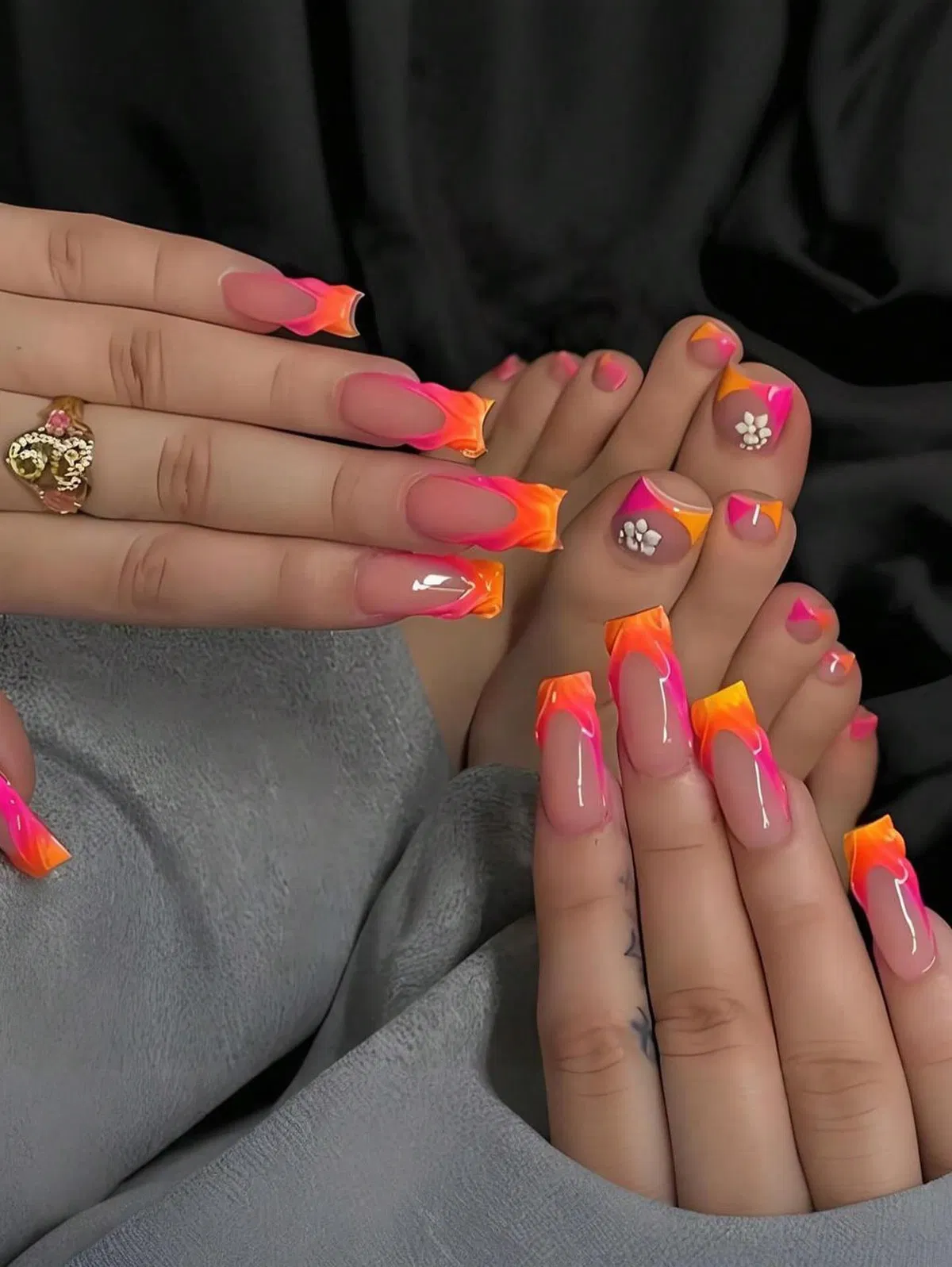 Matching neon flame tips on hands and feet