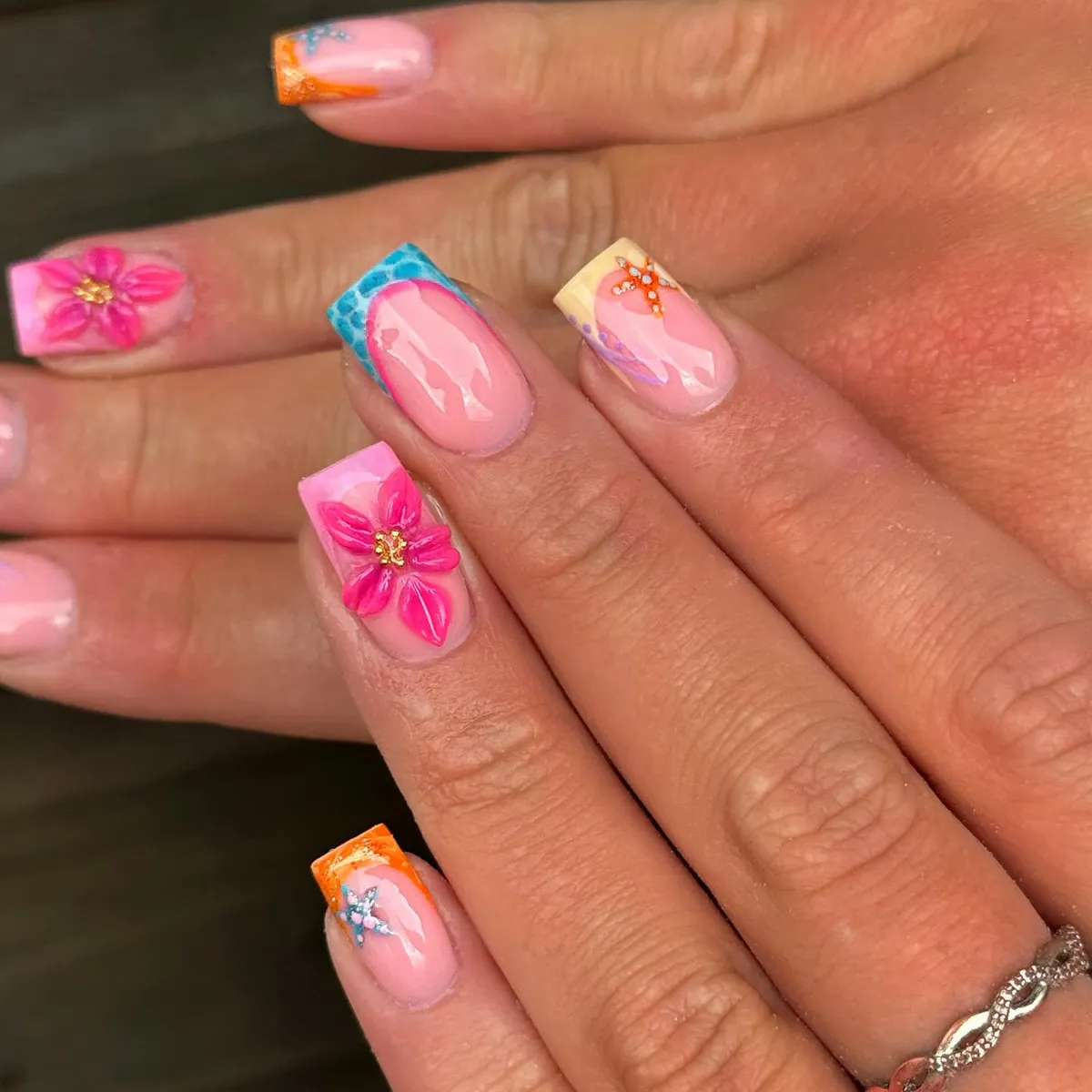 Mixed bright tips with 3D pink flowers and starfish motifs