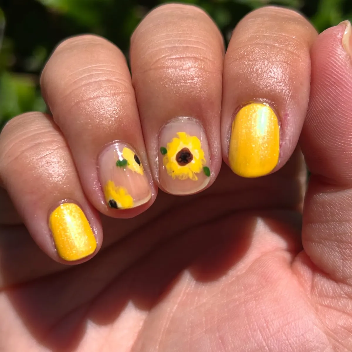 Shimmery yellow with simple sunflower-and-leaf accents