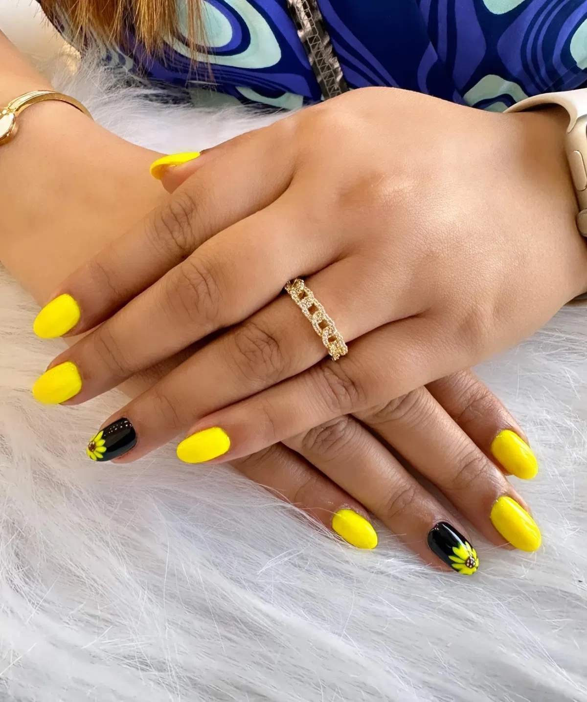 Bright yellow nails with black sunflower accent nails
