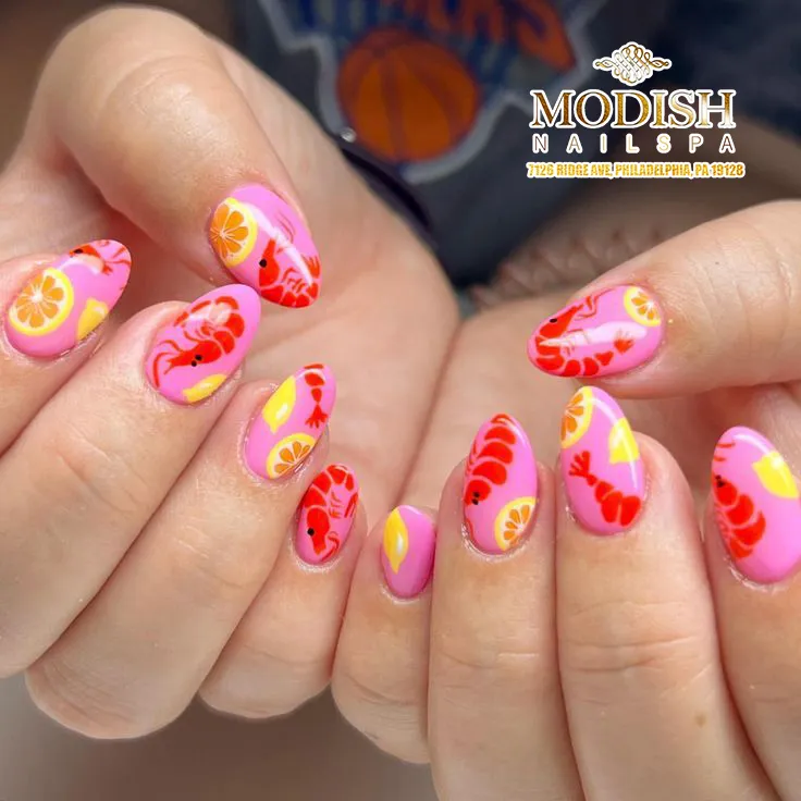 Pink Nails with Red Graphic Motifs and Citrus Slices