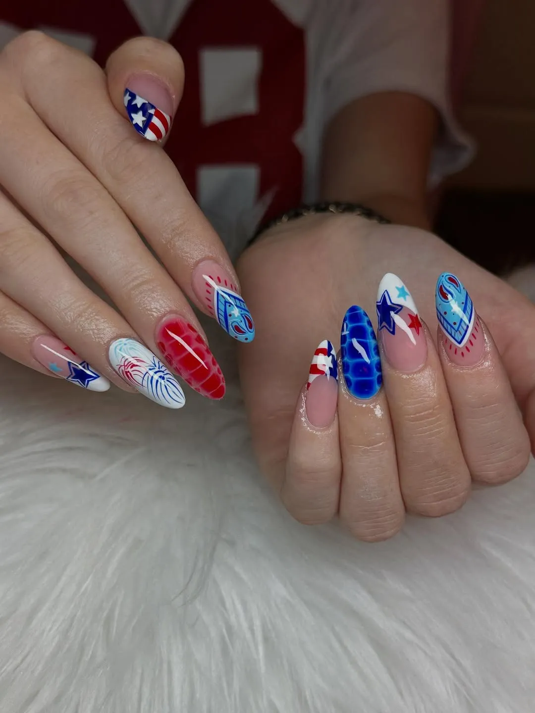 Pink-base mix with stars, stripes, and blue grid accents