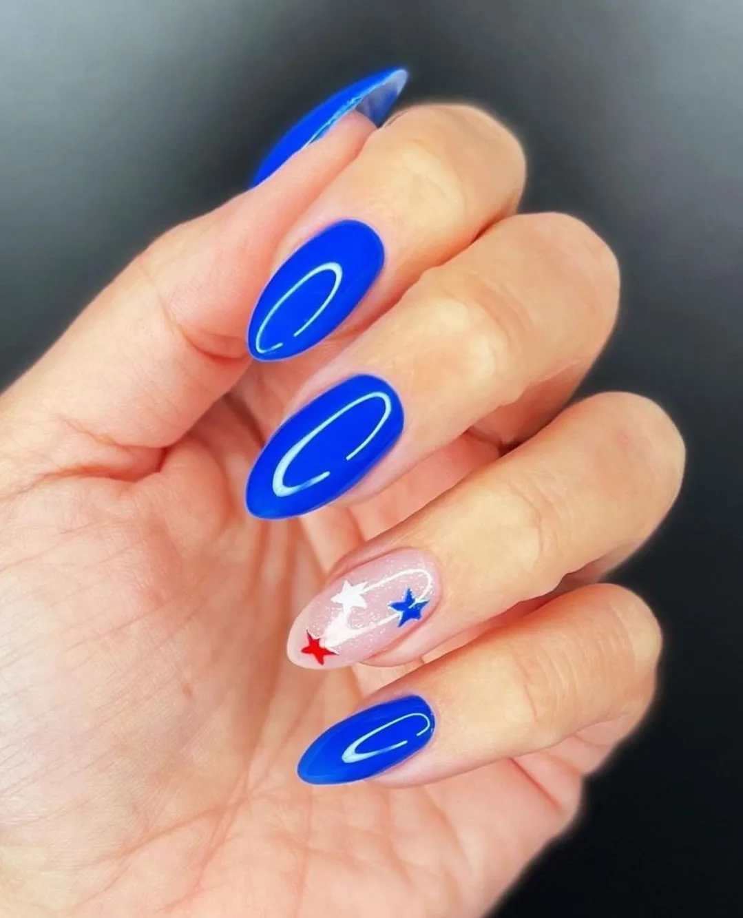 Bright Blue Almond Nails with a Simple Star Accent