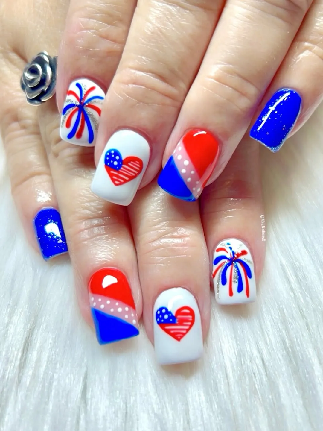 Fireworks and heart motifs in red, white, and blue