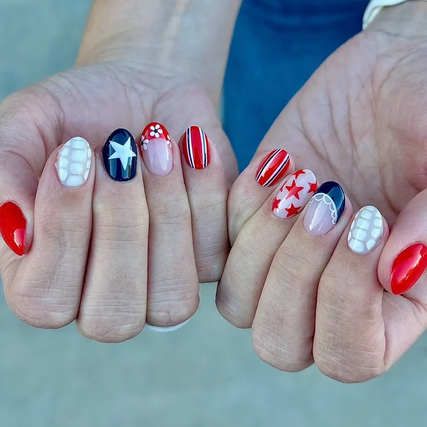 Mixed patriotic nail set with stars, stripes, and grid-like accents