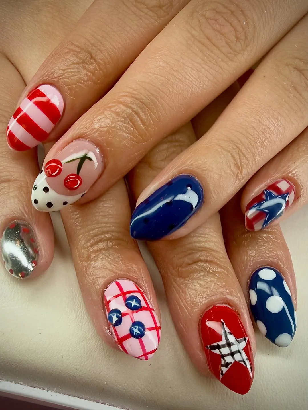 Mixed patterns: stripes, polka dots, cherries, grid, and star