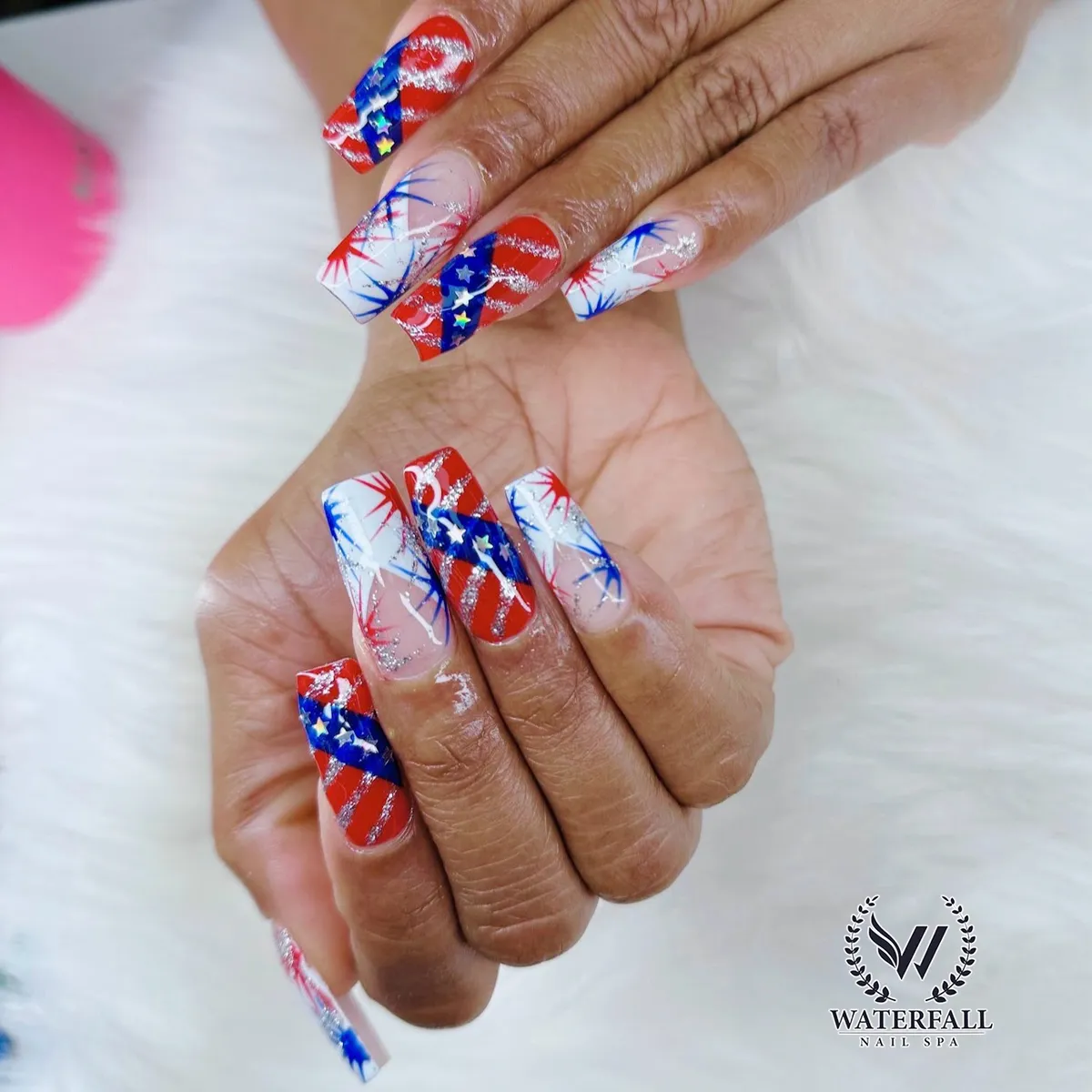 Long square nails with diagonal bands and glitter lines