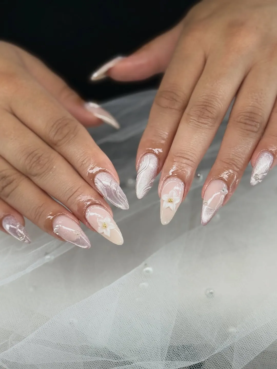 Pearly swirls with 3D white flowers and small rhinestones