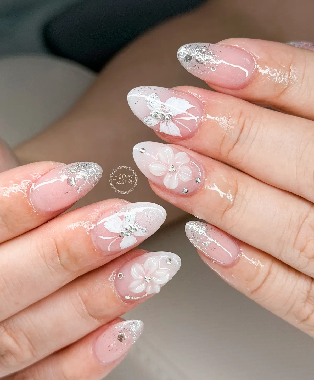 Silver glitter tips with white floral accents