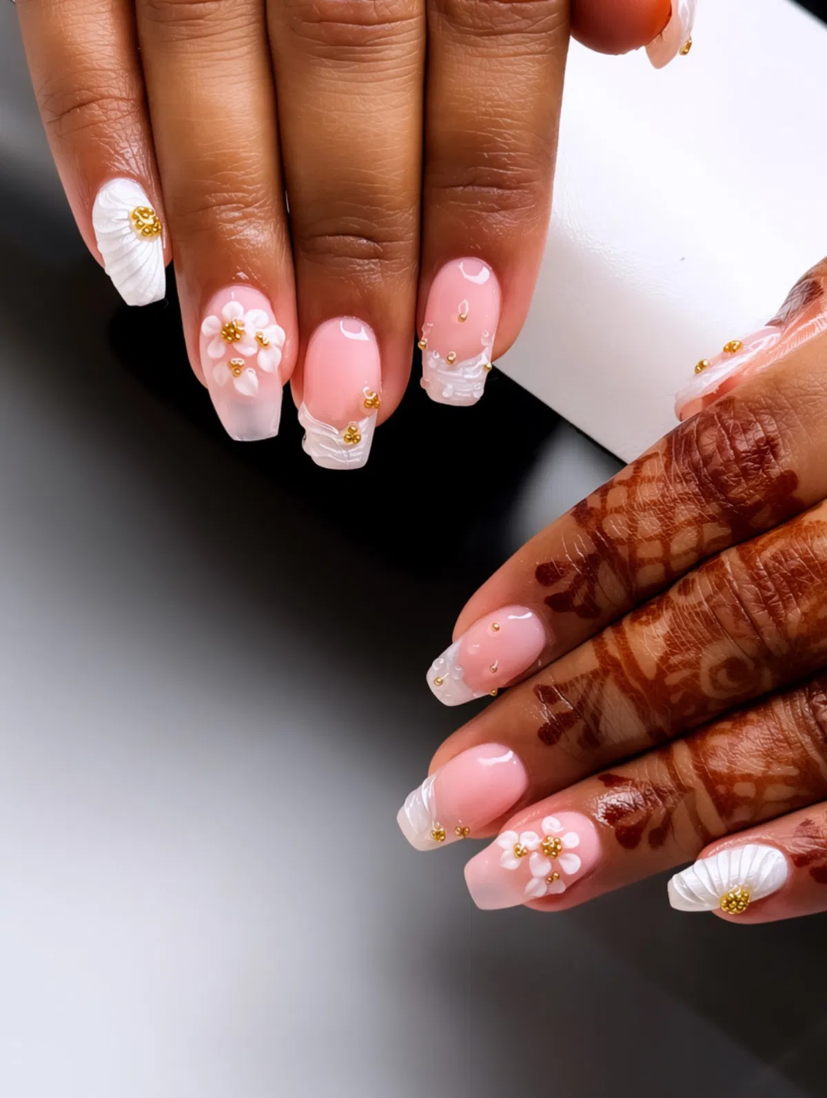 Pink ombré square nails with 3D white florals and gold beads