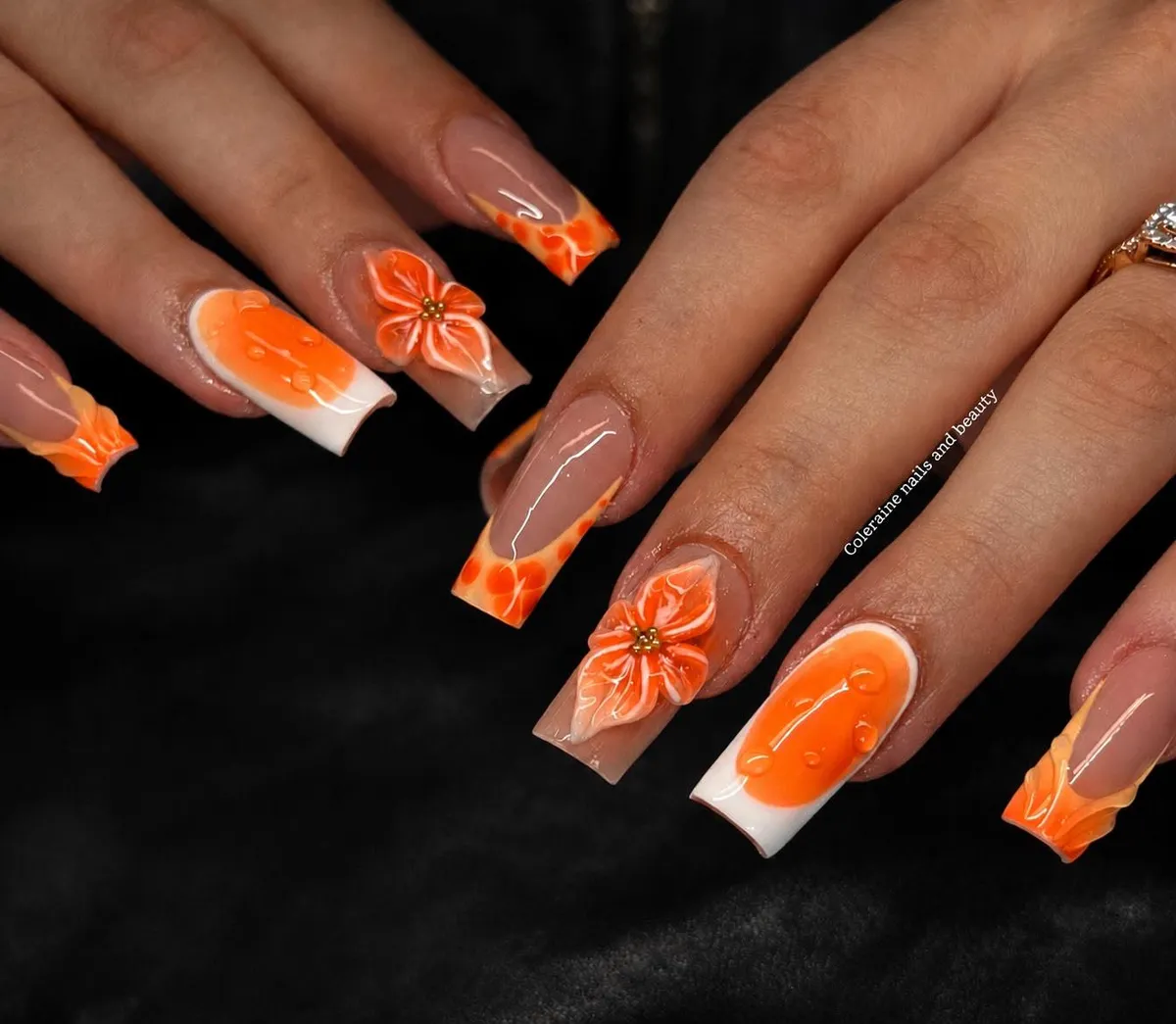 Square Orange Tip Designs with Raised Flowers and Droplet Details