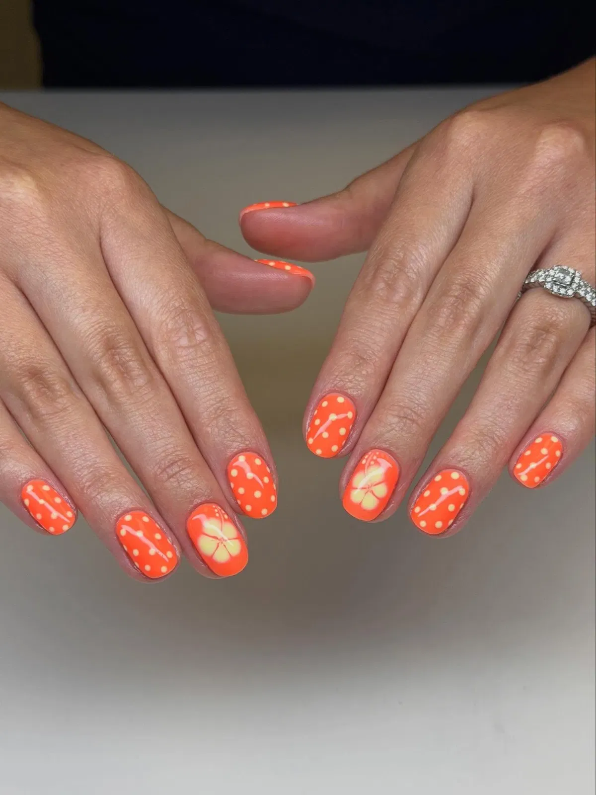 Orange Polka Dots and White Lines with Floral Accent