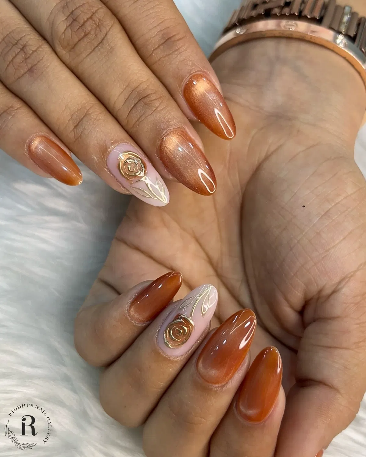Coppery burnt shimmer with raised gold rose accents