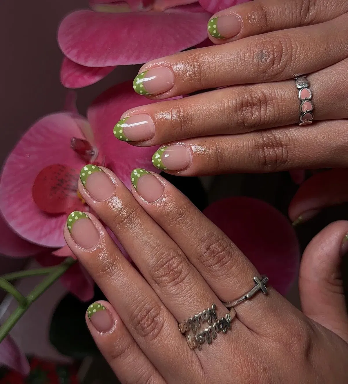 Cream nails with black dots and fine-line accents