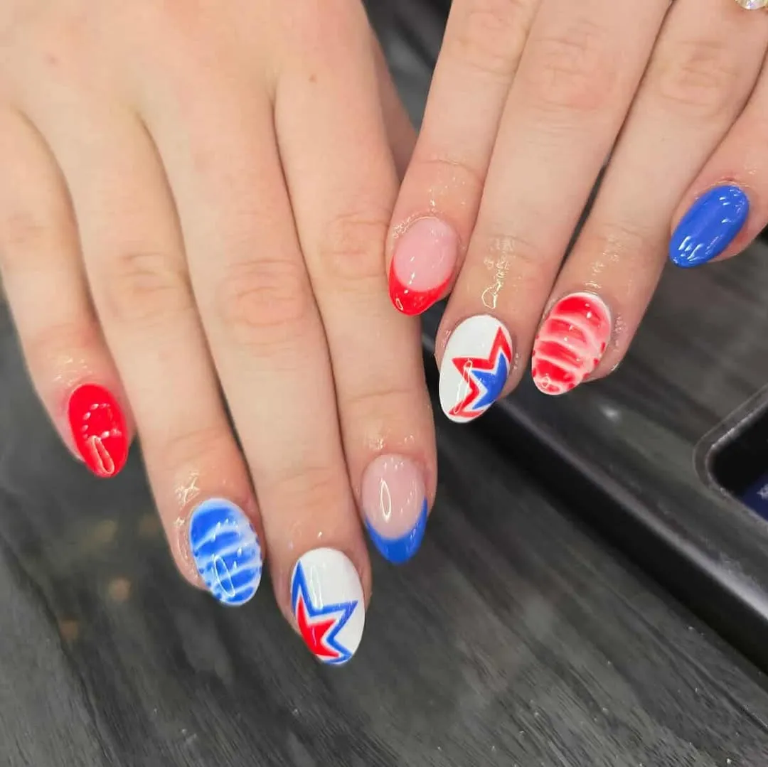 Color-tip French with bold red-and-blue star outlines