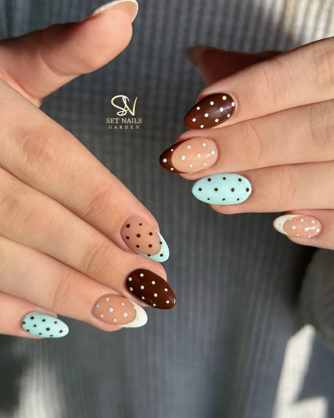 Color-blocked polka dots in brown, nude, and light blue