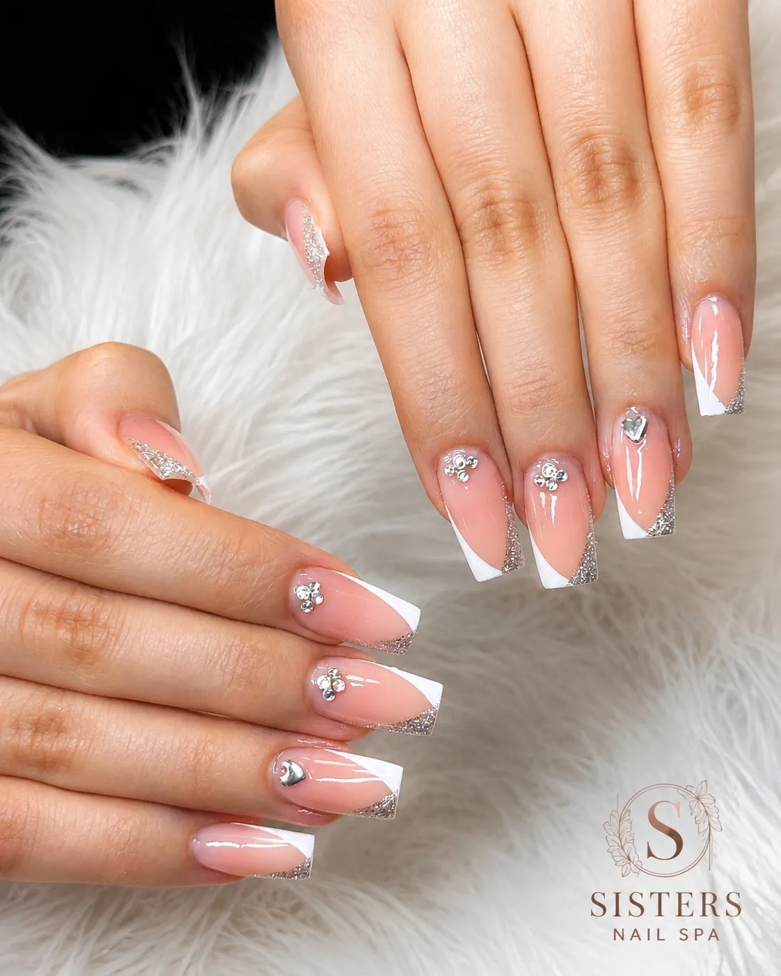 Square French tips with silver glitter edges and rhinestone accents