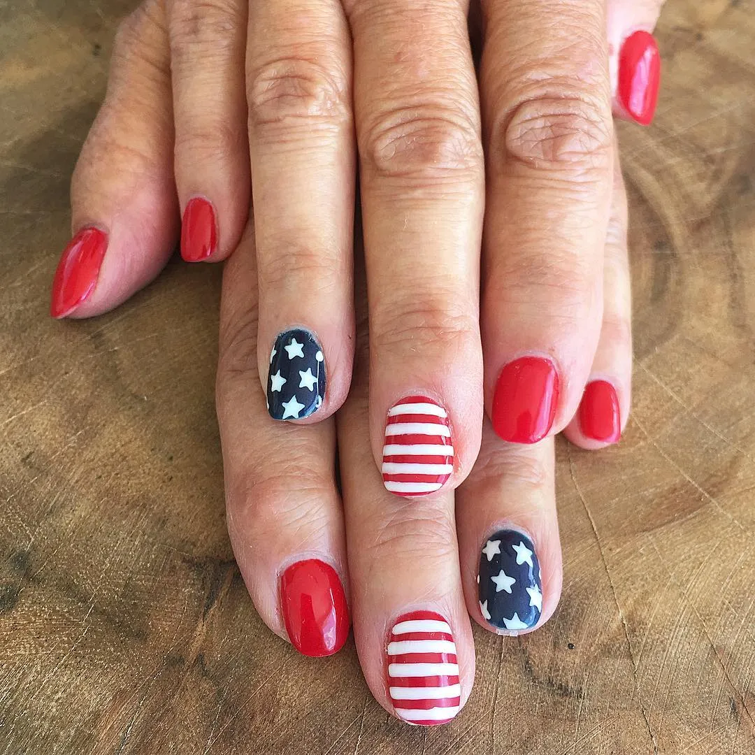 Red Nails with Star and Stripe Accents