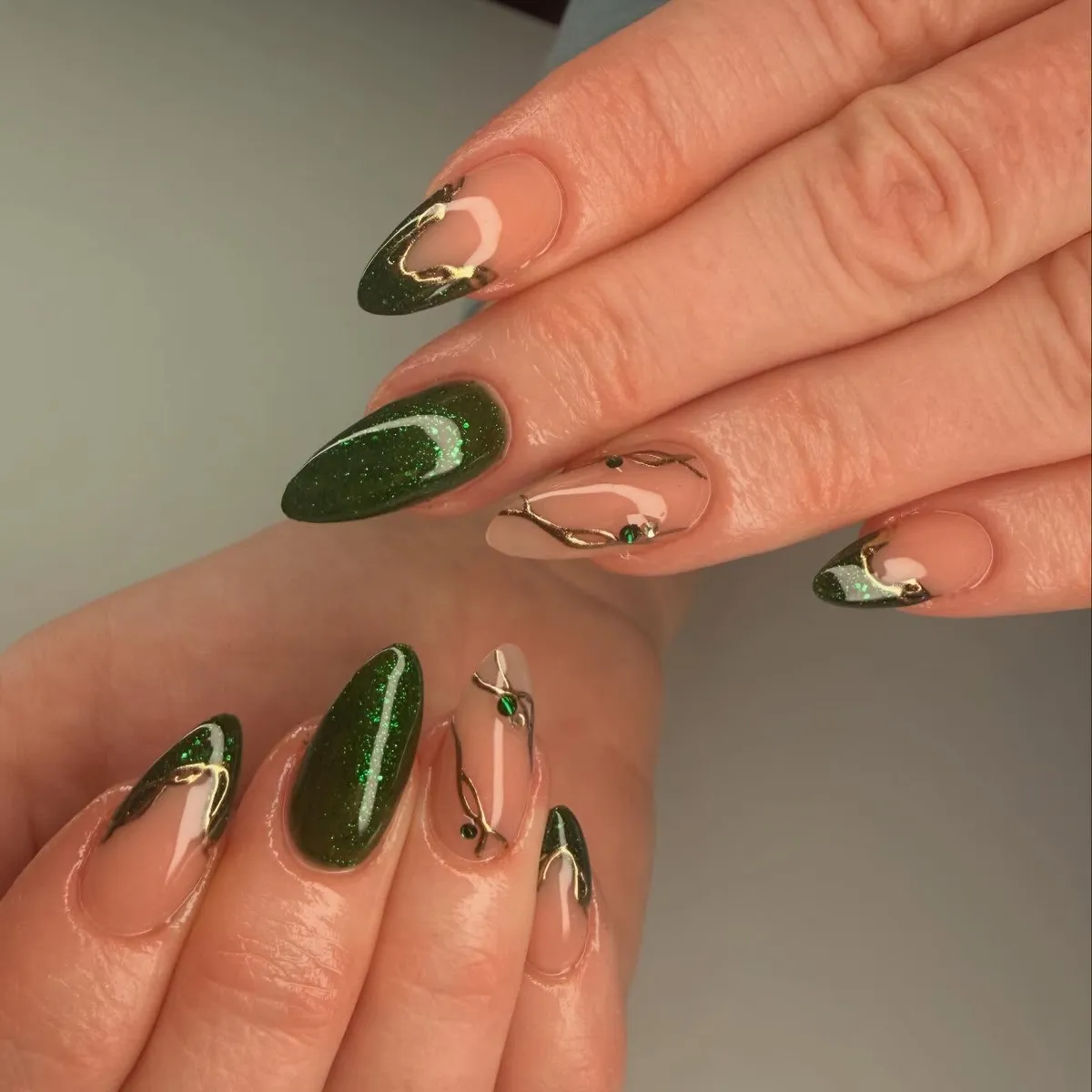 Deep green glitter with gold vine lines on nude bases