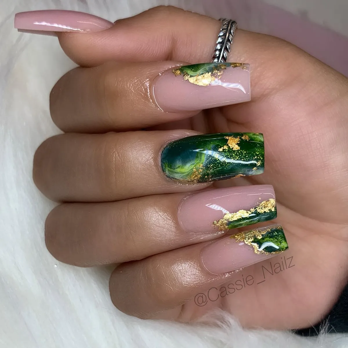 Nude-and-green marble with gold flake accents