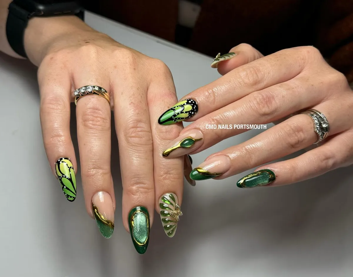 Mixed green-and-gold outlines with graphic wing and fan motifs