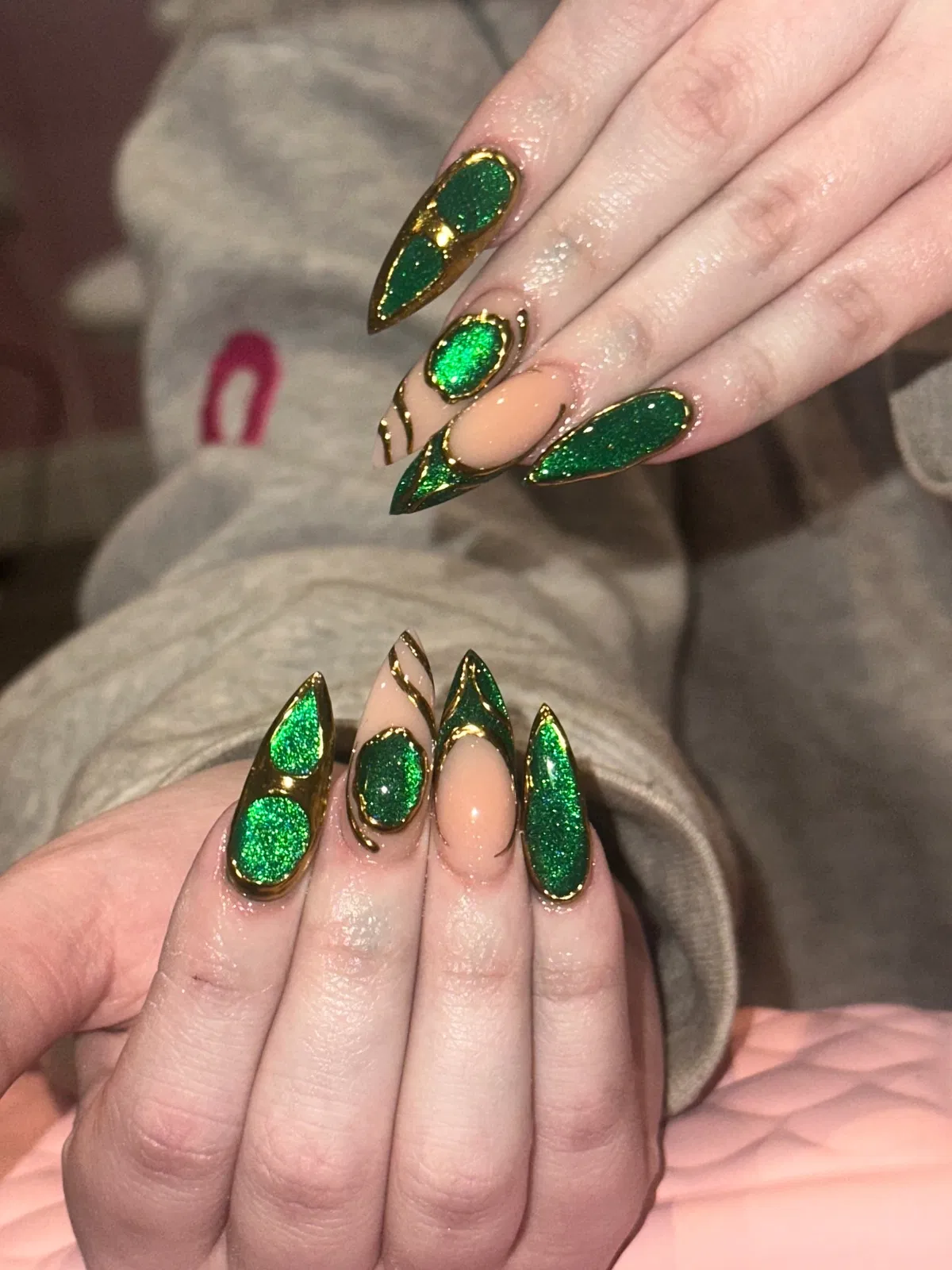 Green glitter with gold framing and negative space