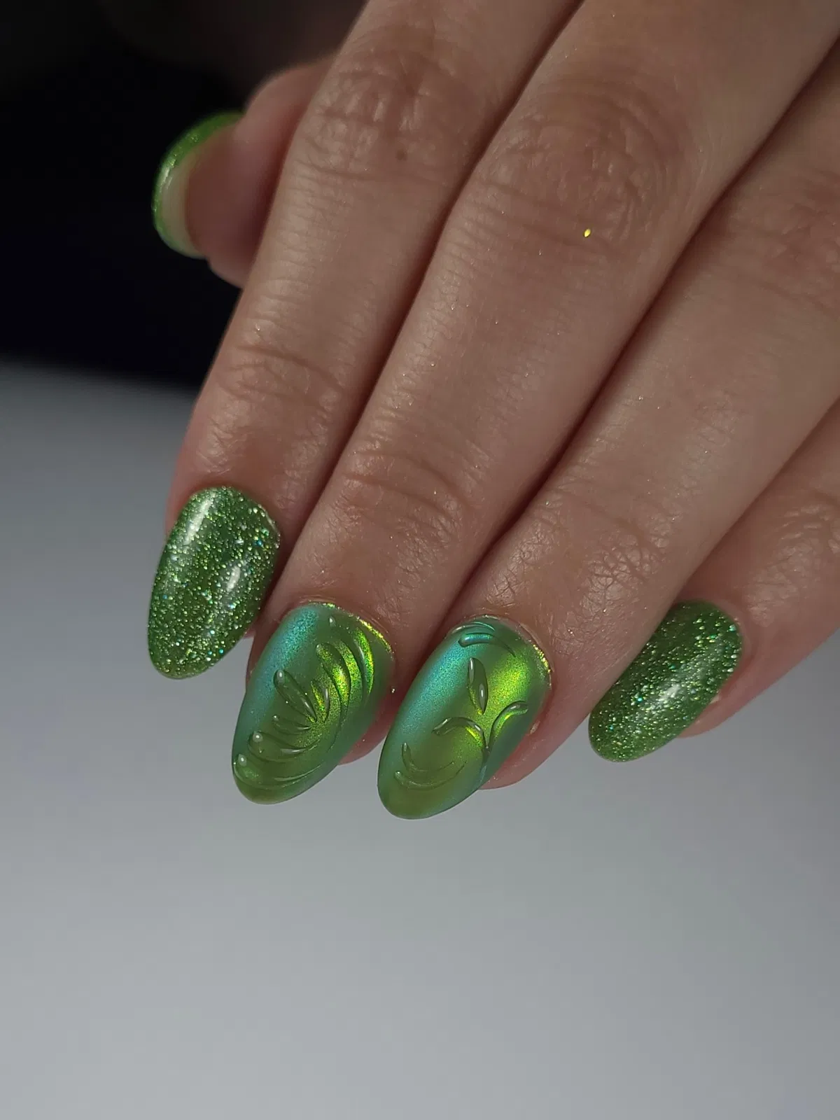 Glitter green with raised leaf-like detailing