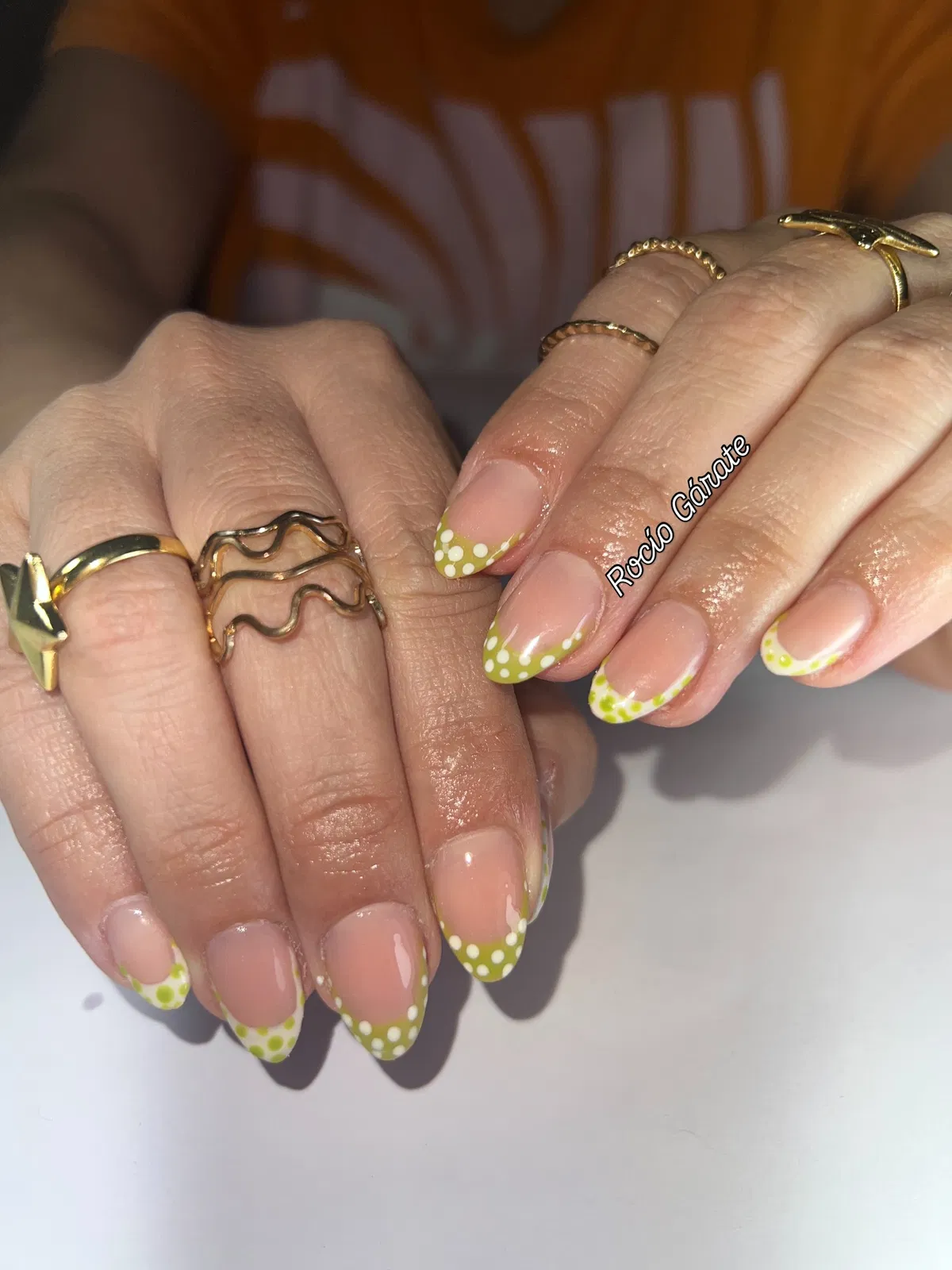 Green-and-white polka-dot French tips (alternate angle)