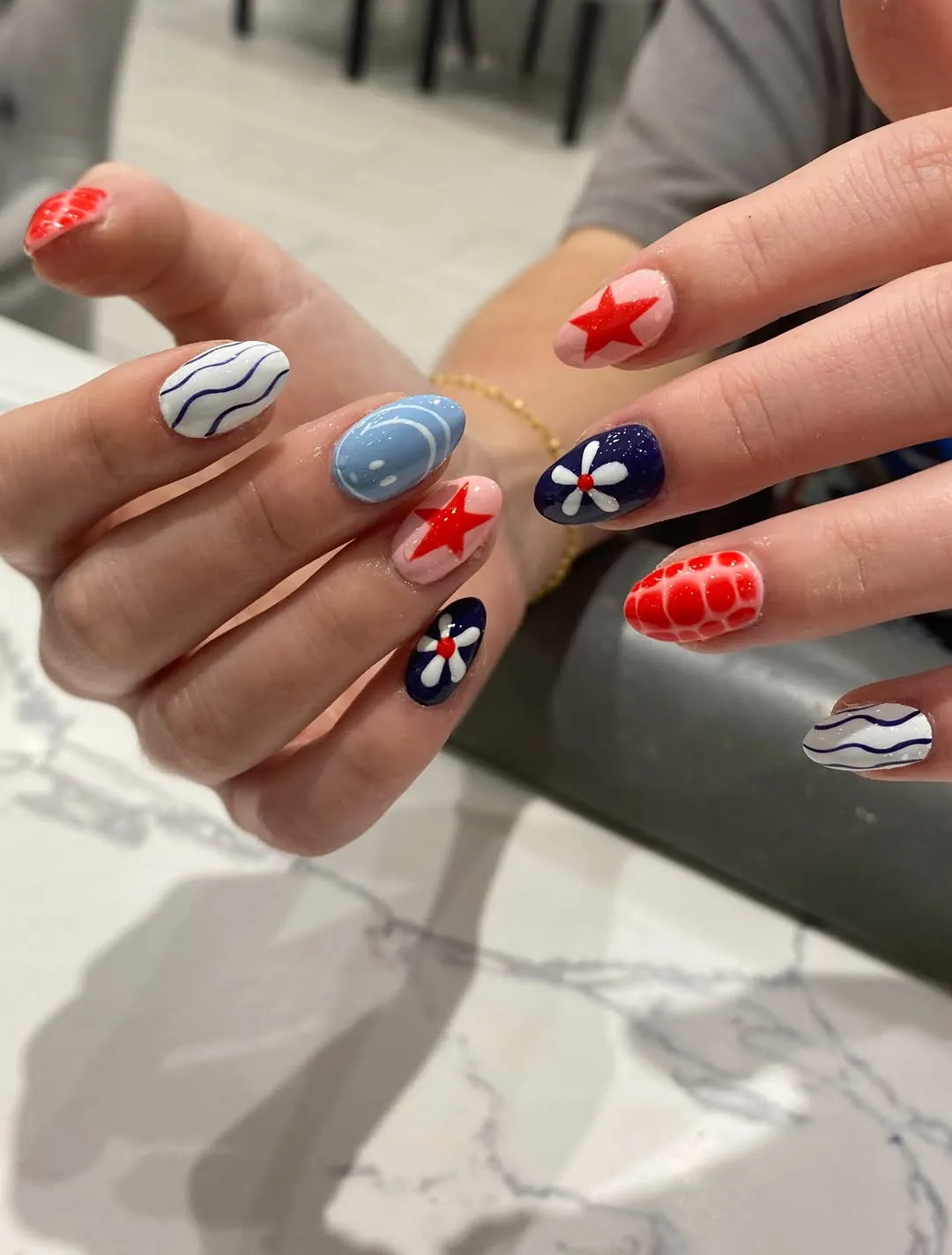 Stars, florals, waves, and bold red accents