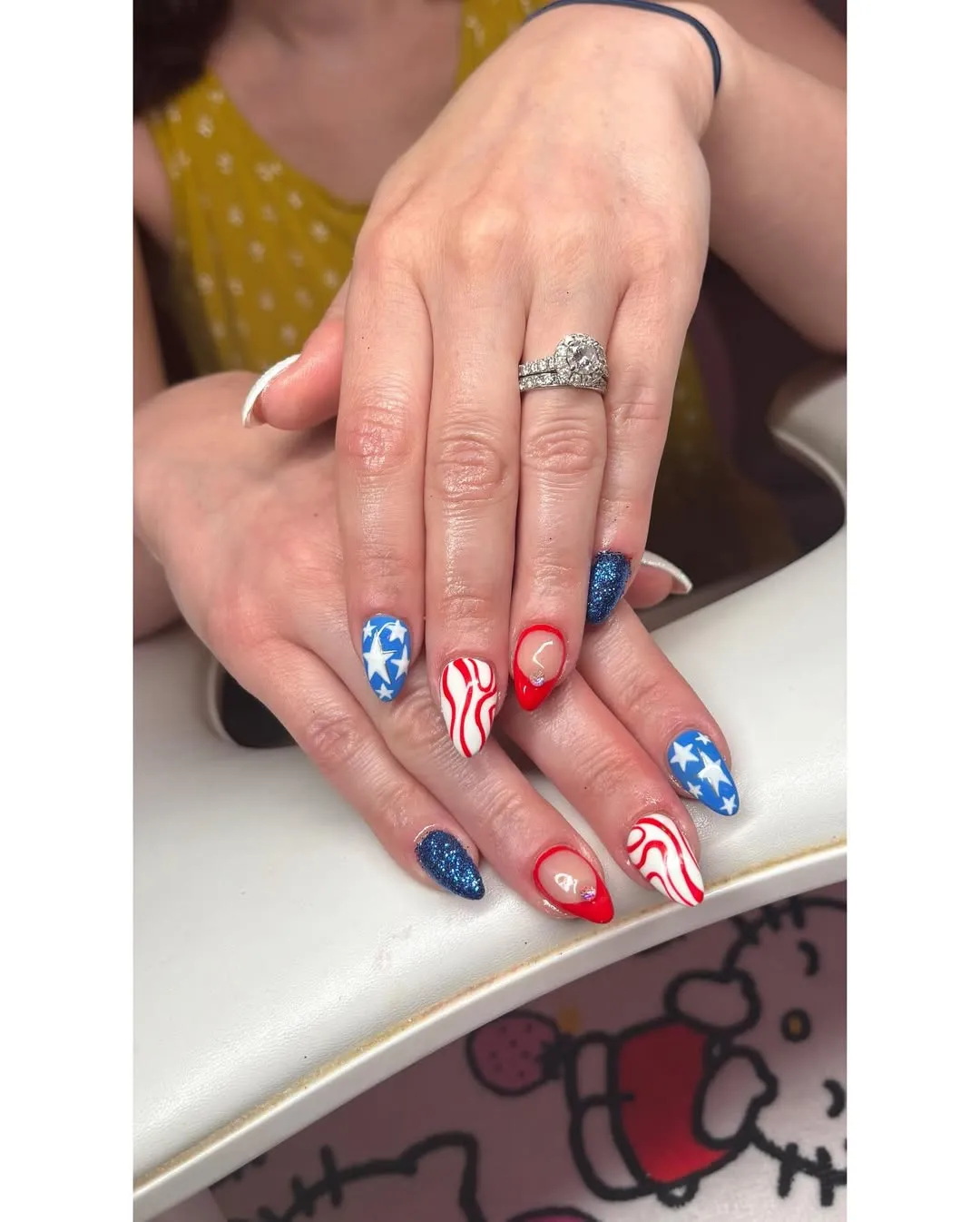 Blue glitter with star accents and red-tipped details