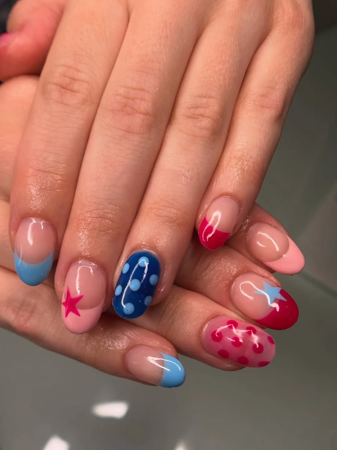 Bright French tips with stars and polka dots