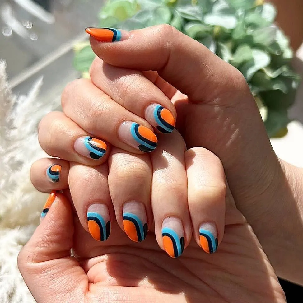 Graphic orange-and-teal arcs on a nude base