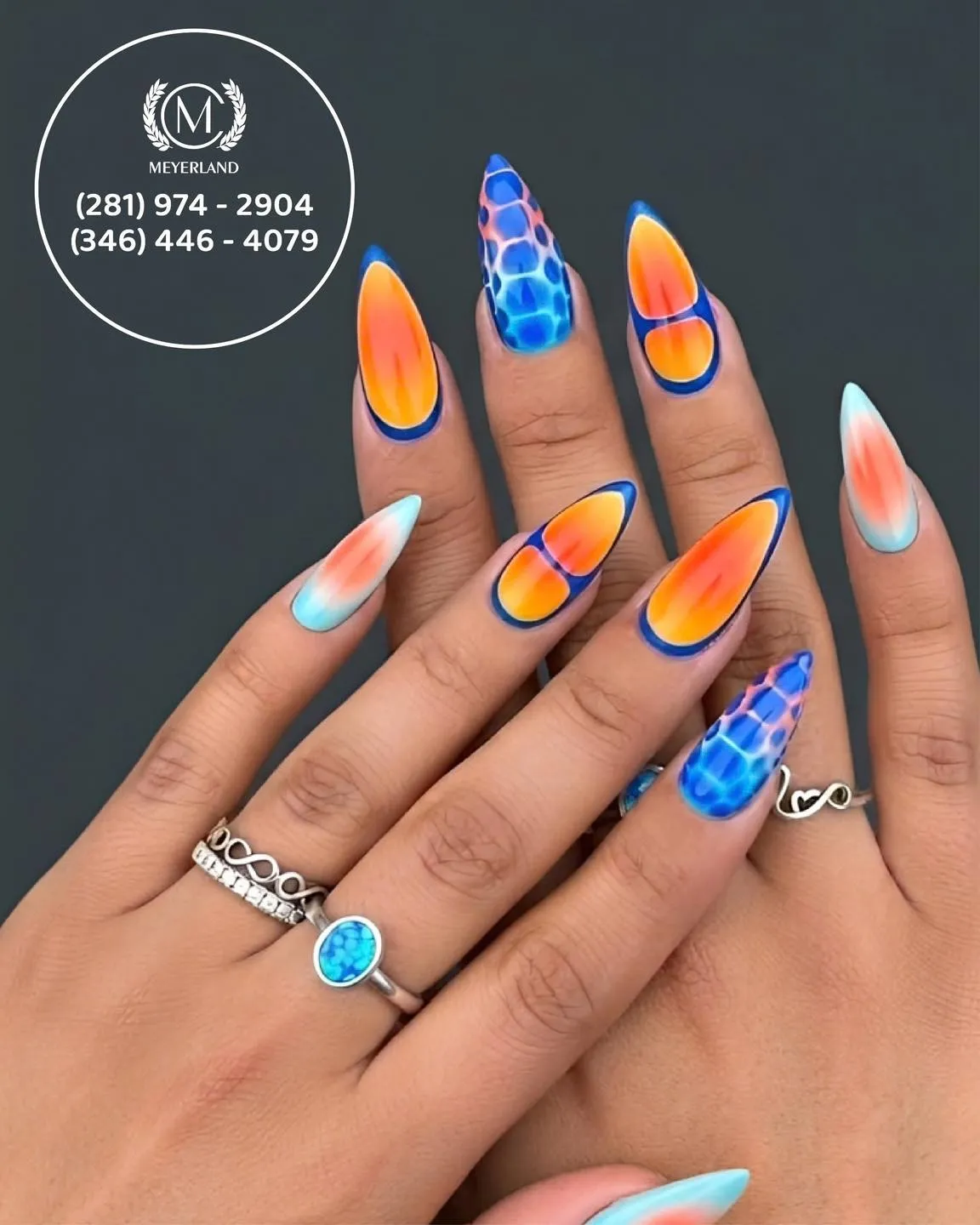 Orange ombrΓ© panels outlined in blue with blue patterned accents