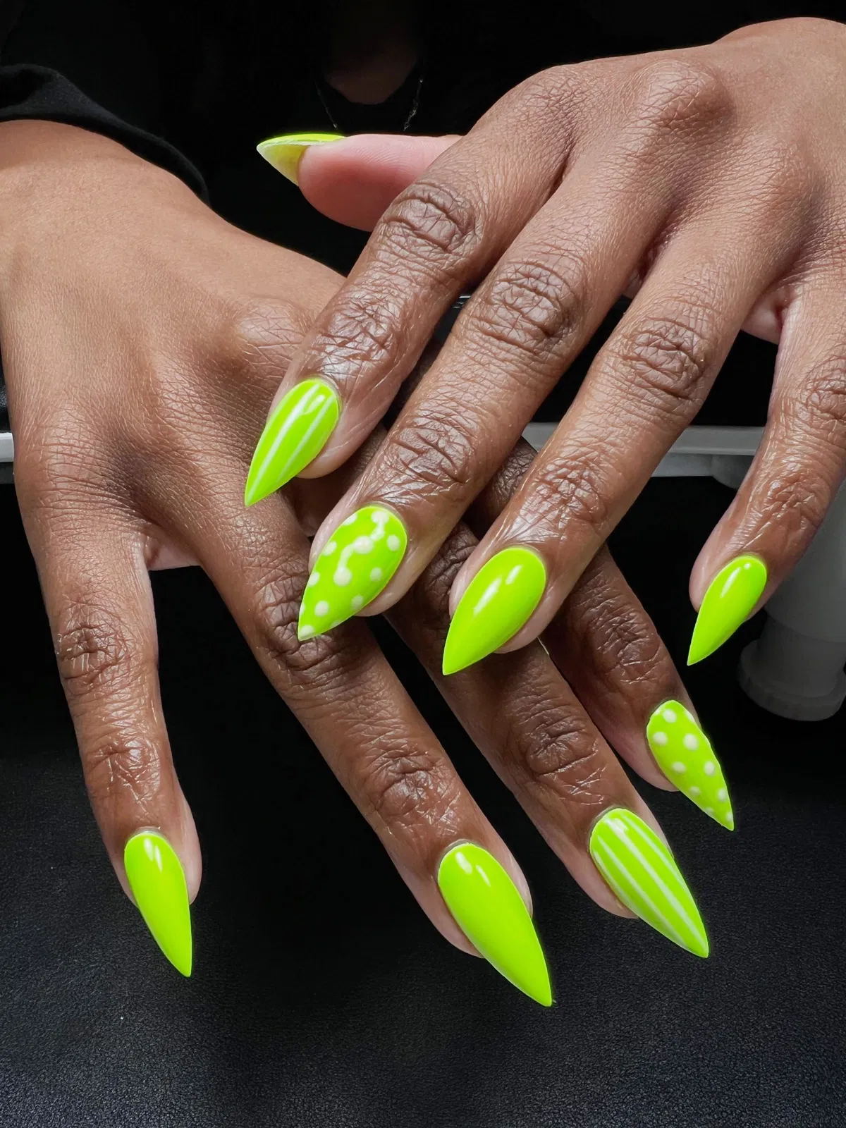 Neon lime stilettos with polka dots and stripes