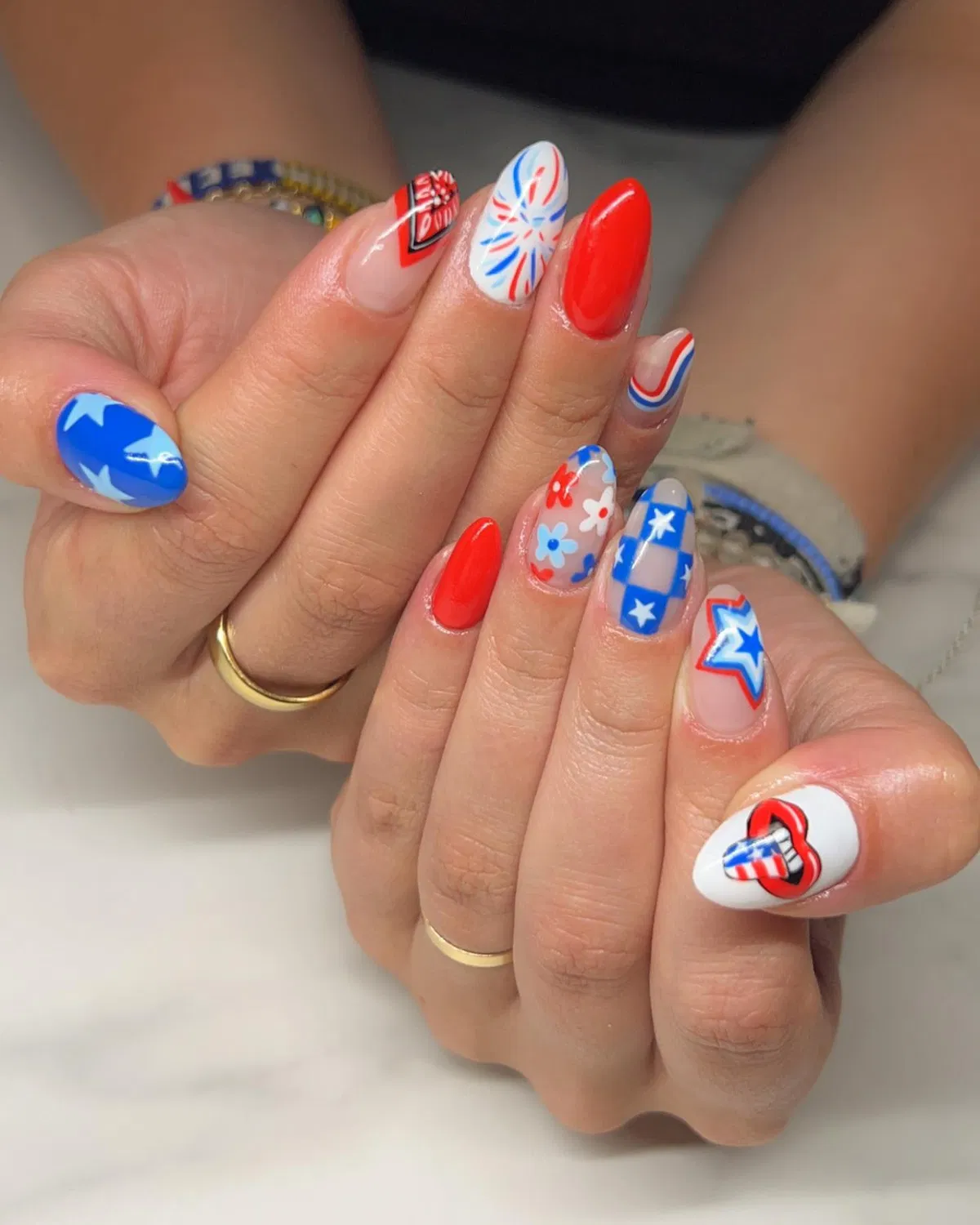 Stars, checkers, fireworks, and a striped heart graphic