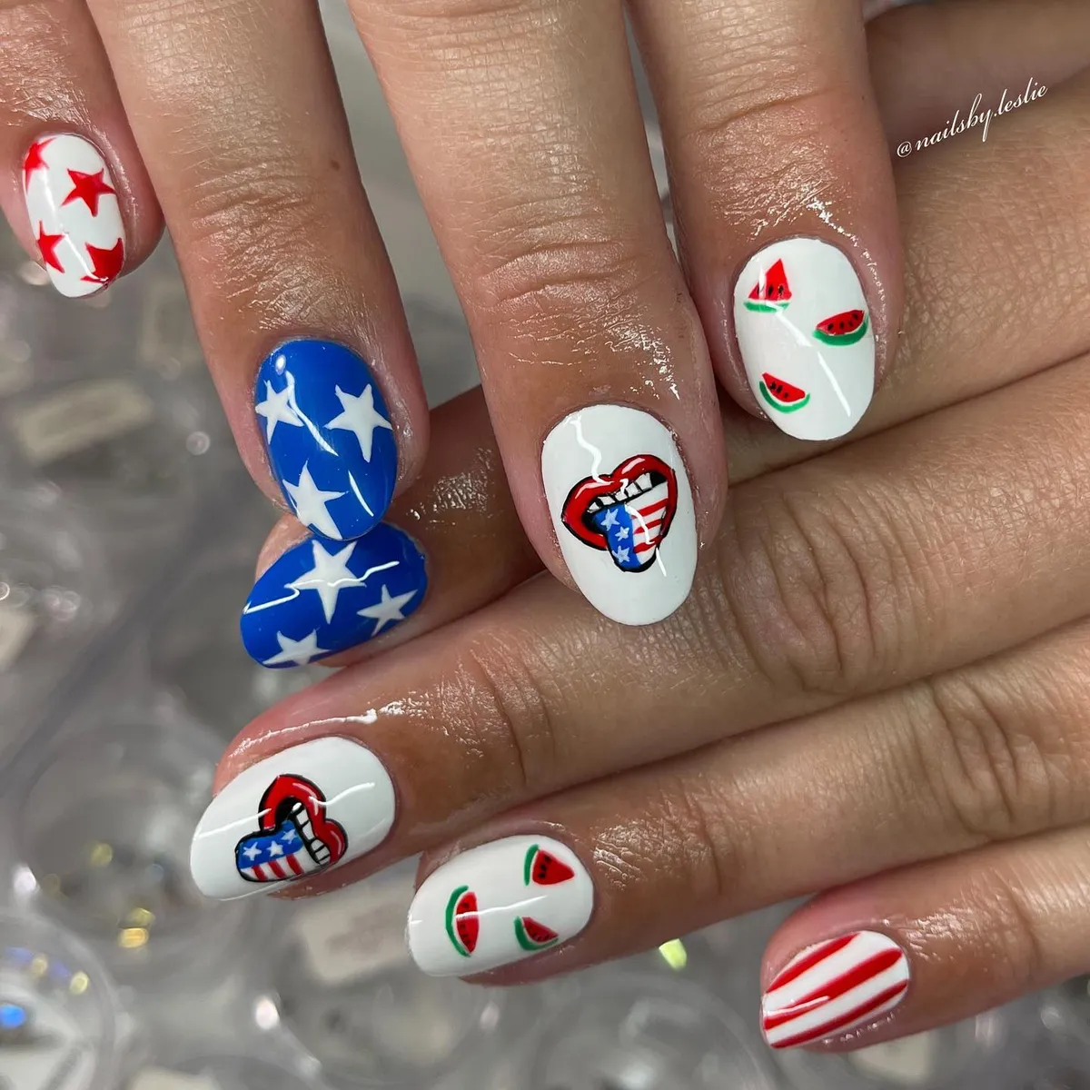 Stars, watermelon slices, and a red-lips graphic on white