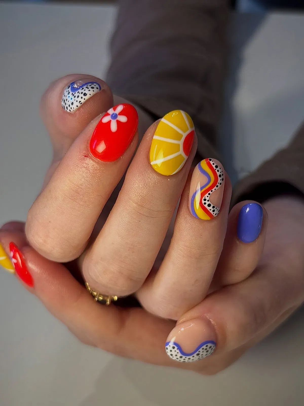 Primary brights with florals, segments, and wavy stripe accents