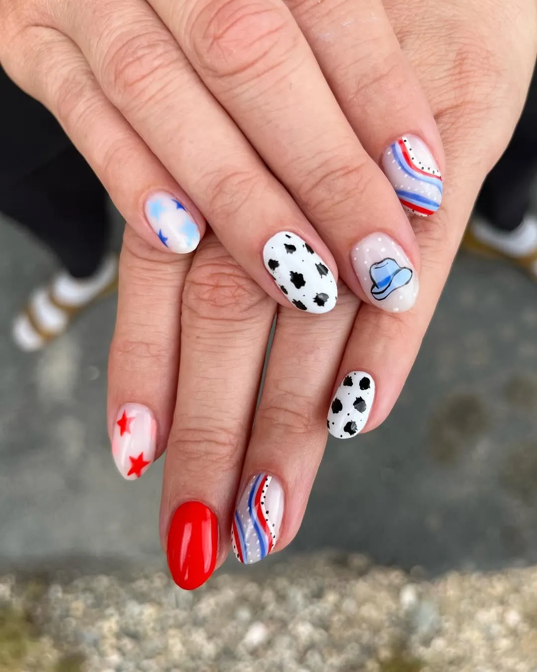 Mixed motifs: red solids, spotted white, and curved stripes