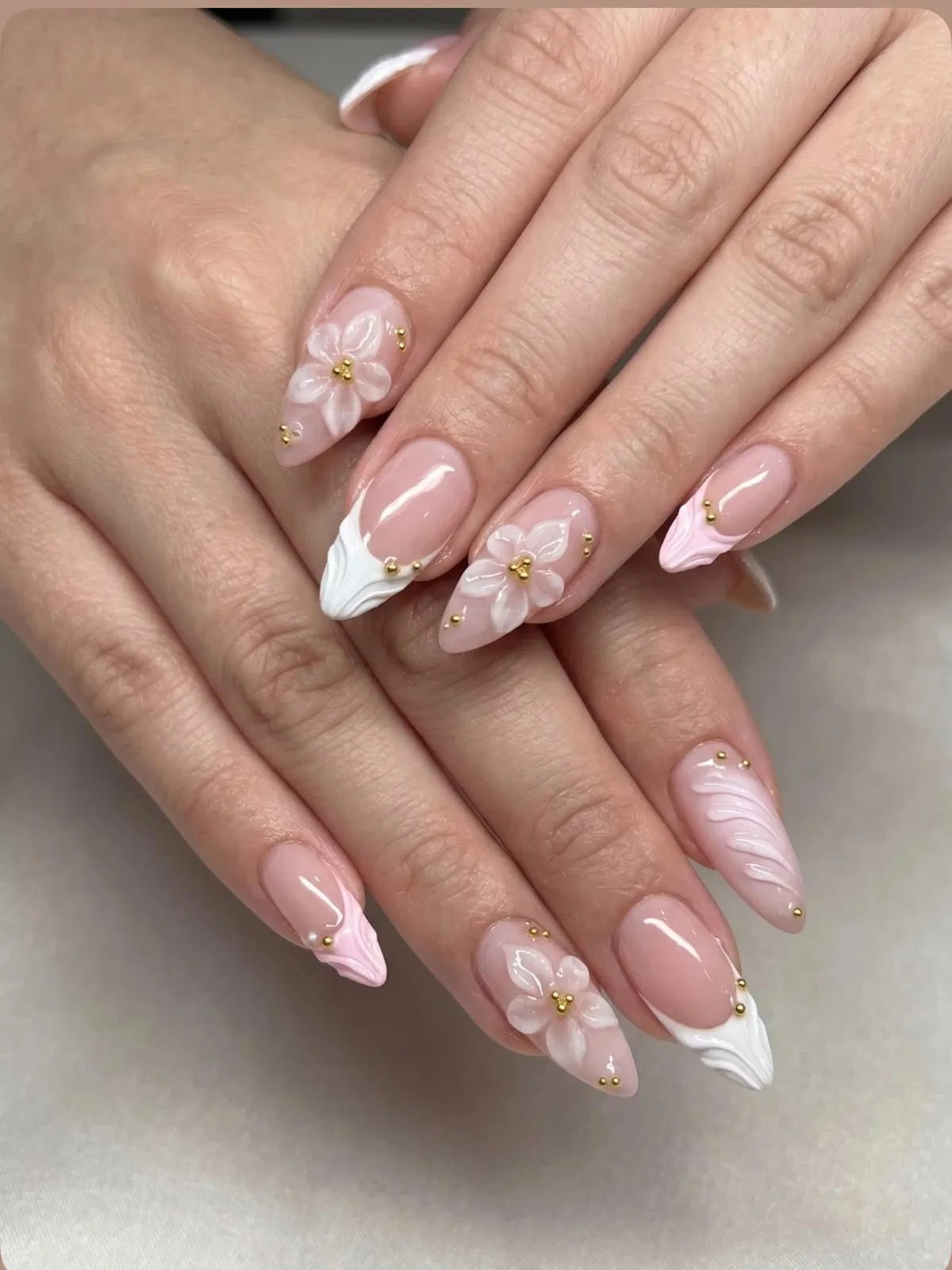 3D flowers with sculpted white tips and gold beads