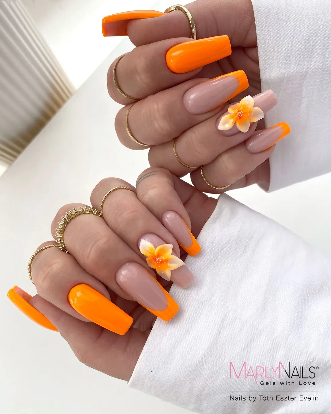 Square orange French tips with 3D white-orange flowers