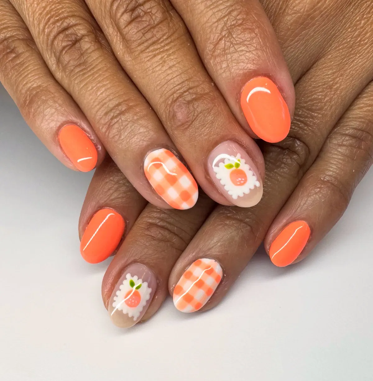 Coral-orange solids with gingham and scalloped accents